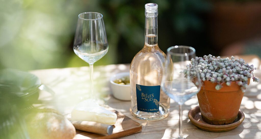 A bottle of Belles du Sud Rose wine outdoors